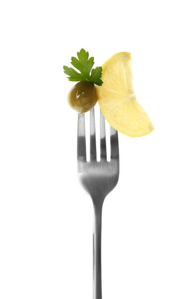 Fork with tasty olive, parsley and lemon isolated on white