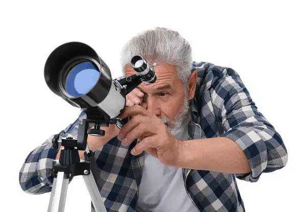 stock image Senior astronomer looking at stars through telescope on white background