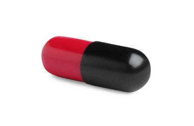 Beyaz arka planda bir hap. Tıbbi tedavi