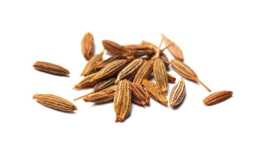 Beyaz üzerine izole edilmiş aromatik kimyon (Farsça kimyon) tohumu yığını