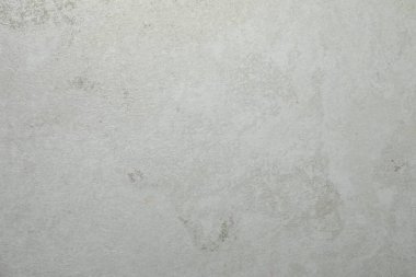 Açık gri taş yüzeyin dokusu arkaplan olarak, yakın plan