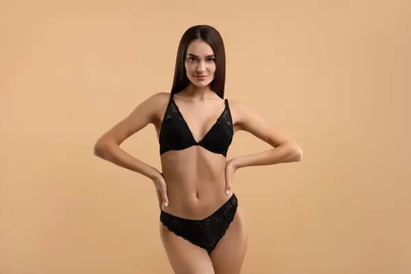 Young Woman Elegant Black Underwear Beige Background — Stock Photo, Image