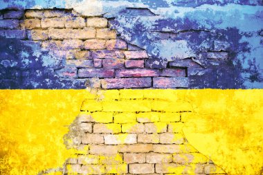 National flag of Ukraine painted on old brick wall clipart