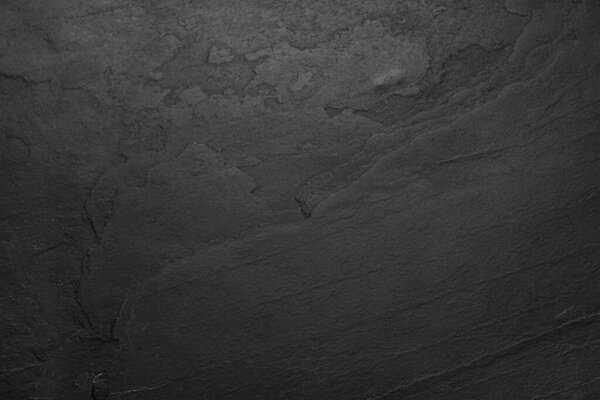 Текстура черного камня в качестве фона, крупным планом