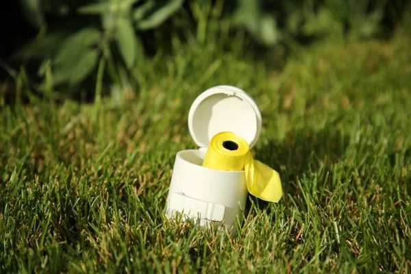 Holder Dog Waste Bags Green Grass Sunny Day — Stock Photo, Image
