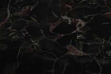 Arkaplan olarak siyah mermer yüzey, yakın görünüm