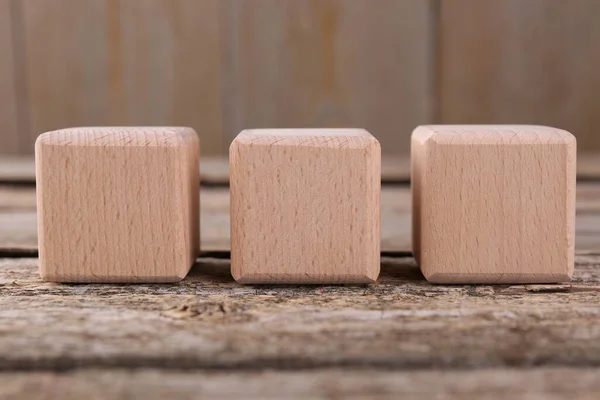 International Organization for Standardization. Cubes with abbreviation ISO on wooden table, closeup