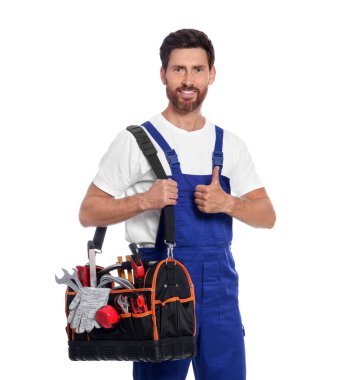 Professional plumber with tool bag on white background