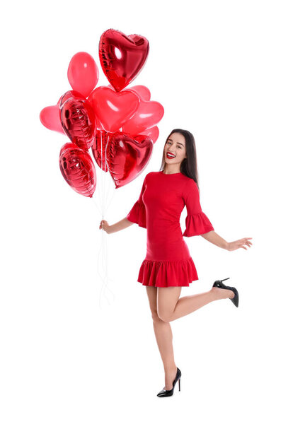 Beautiful girl with heart shaped balloons isolated on white. Valentine's day celebration
