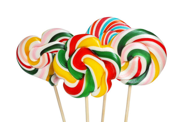 Sticks with colorful lollipops isolated on white