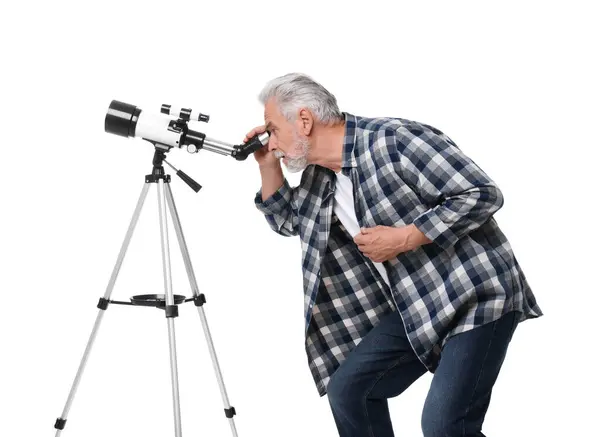 stock image Senior astronomer looking at stars through telescope on white background