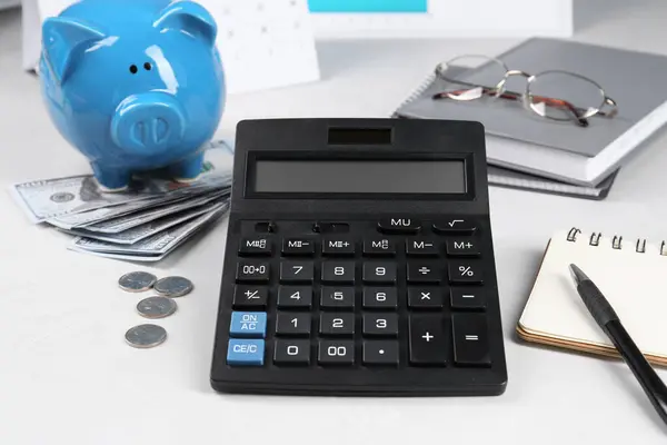 Calculator Piggy Bank Money Glasses Pen Notebooks White Table Pension — Stock Photo, Image