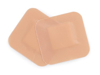 Tıbbi yapıştırıcı bandajlar beyaz, üst görünümde izole