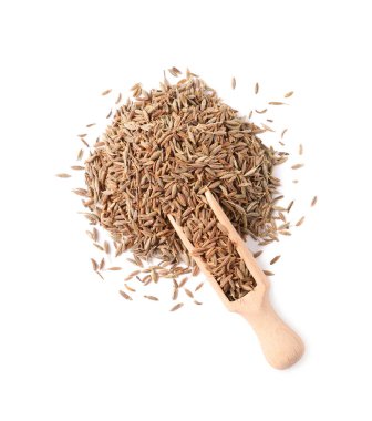 Beyaz, üst görünüm izole aromatik oyma (Farsça kimyon) tohumları kepçe