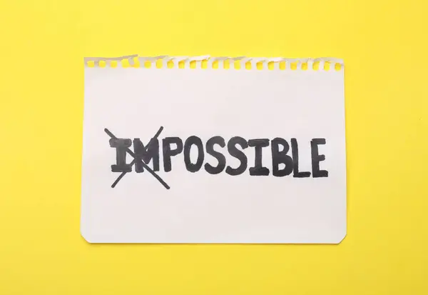 Motivation Concept Paper Changed Word Impossible Possible Crossing Letters Yellow — Stock Photo, Image