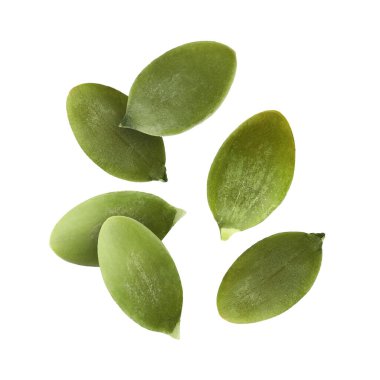 Kabak çekirdekleri beyaz arkaplana düşüyor