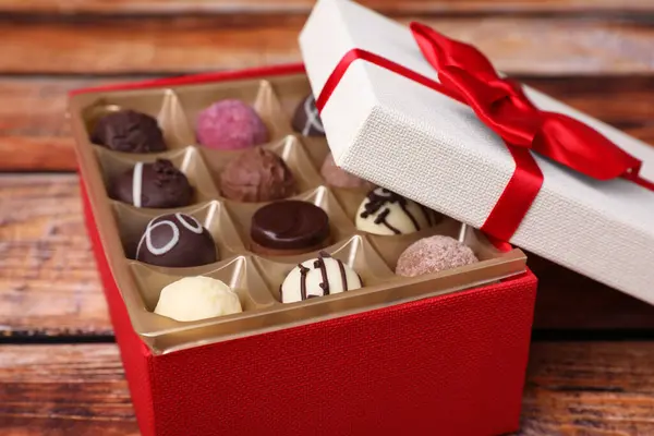 Red Box Tasty Chocolate Candies Wooden Table Closeup Stock Photo