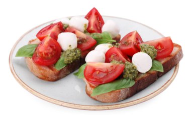 Peynirli, domatesli, fesleğenli ve pesto soslu lezzetli Caprese sandviçleri.