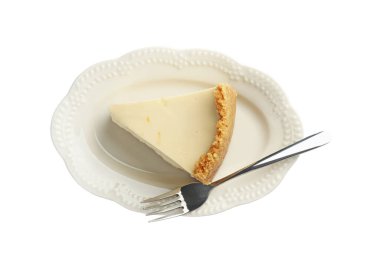 Lezzetli bir parça vejetaryen tofu peynirli kek ve çatal beyaza izole edilmiş.