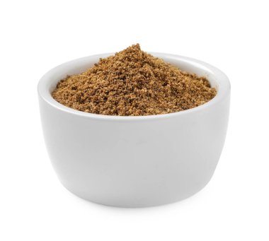 Beyaz üzerine izole edilmiş bir kase aromatik kimyon (Pers kimyonu) tozu.