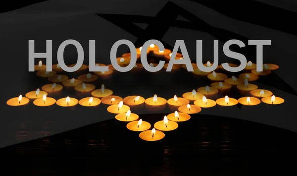 stock image Holocaust memory day, banner design. Star of David made with burning candles and flag of Israel, double exposure