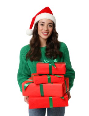 Noel Baba şapkalı güzel genç bir kadın. Beyaz tenli, Noel hediyeli.