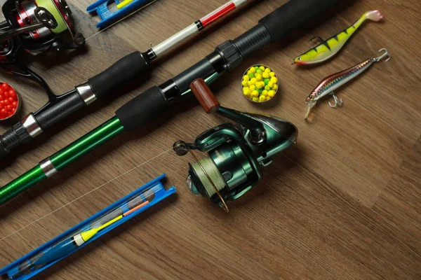 Spinning Rods Fishing Tackle Wooden Background Flat Lay — Stock Photo, Image