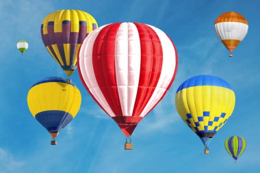 Gökyüzünde bir sürü parlak sıcak hava balonu uçuşuyor.