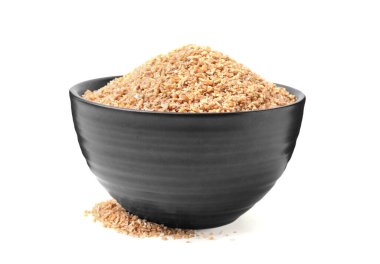 Beyaz kasedeki kuru buğday inlemeleri.