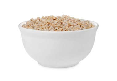 Beyaz tenceredeki kaynamış yulaf ezmesi.