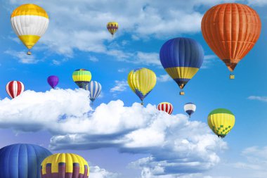 Gökyüzünde bir sürü parlak sıcak hava balonu uçuşuyor.