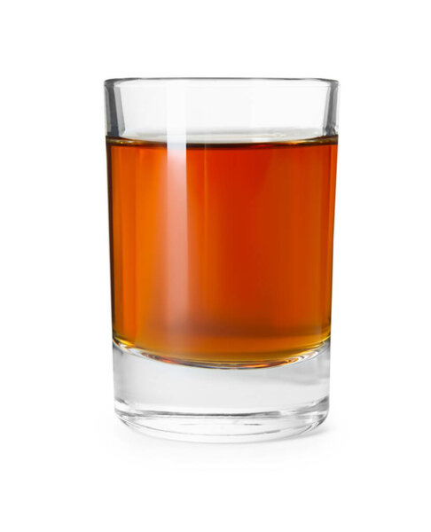 Shot glass with tasty amaretto liqueur isolated on white