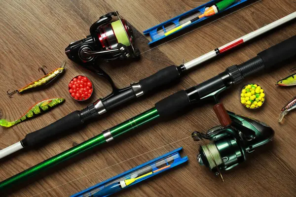 Spinning Rods Fishing Tackle Wooden Background View Flat Lay — Stock Photo, Image