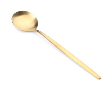 Parlak altın bir kaşık beyaz üzerine izole edilmiş