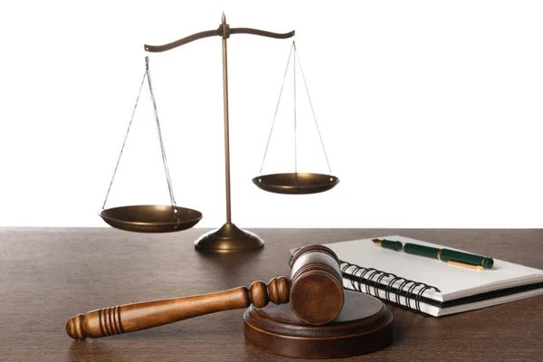 stock image Law concept. Gavel, scales of justice, notebook and pen on wooden table against white background