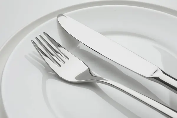 Clean Plates Fork Knife White Background Closeup — Stock Photo, Image