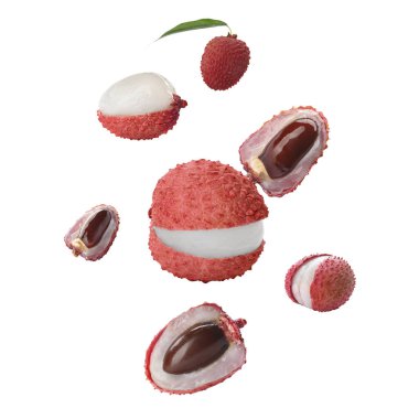 Birçok lychees beyaz arka plana düşüyor. Egzotik meyve