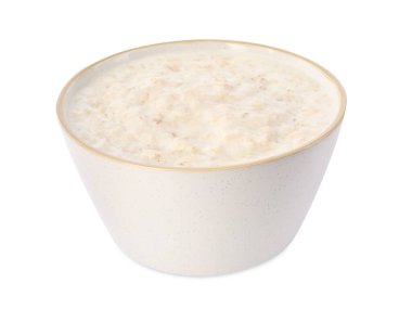 Beyaz tenceredeki kaynamış yulaf ezmesi.