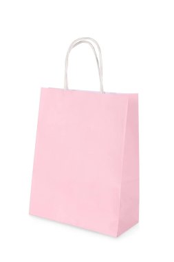 Bir açık pembe kağıt alışveriş çantası beyaza izole edilmiş.