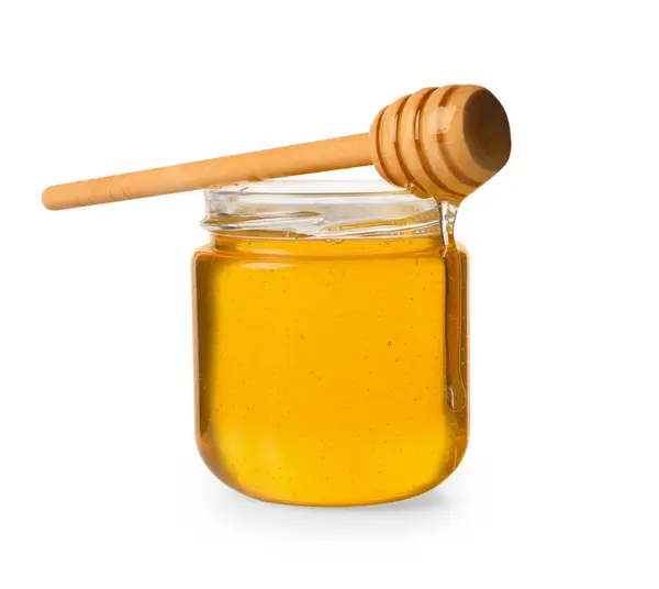 Leckerer Honig Glas Und Löffel Isoliert Auf Weiß — Stockfoto