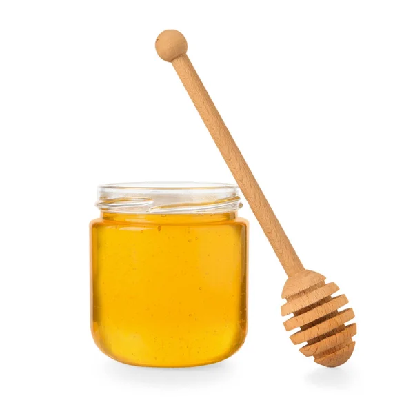Leckerer Honig Glas Und Löffel Isoliert Auf Weiß — Stockfoto