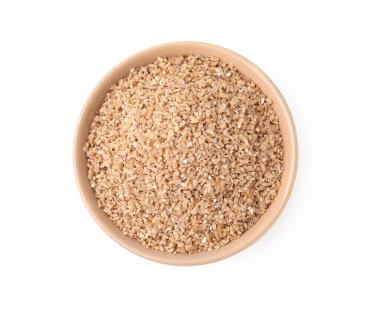 Beyaz kasede kuru buğday homurdanır.