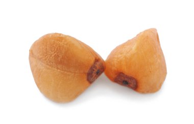 Beyaz, makro manzaralı iki karabuğday tohumu.