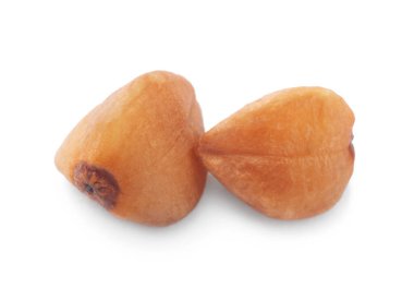 Beyaz, makro manzaralı iki karabuğday tohumu.