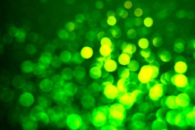 Aziz Patrick günü. Bulanık ışıkları olan yeşil arkaplan, bokeh etkisi