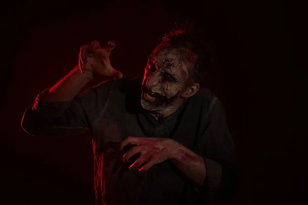 stock image Scary zombie on dark background. Halloween monster