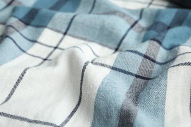 Arkaplan olarak mavi kareli kumaşın dokusu, yakın plan