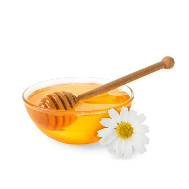 Bal cam kasede, dereotu ve papatya çiçeği beyazda yalıtılmış