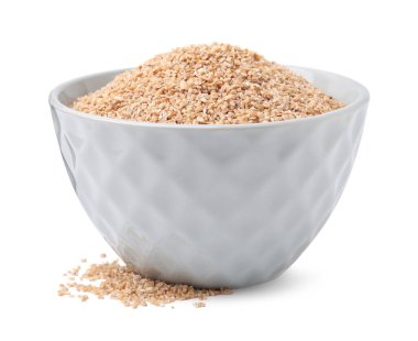 Beyaz kasedeki kuru buğday inlemeleri.