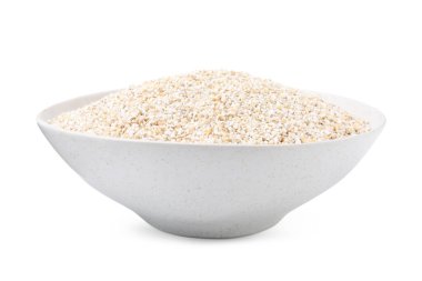 Beyaz kasede kuru arpa homurdanır.